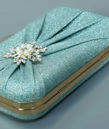 SHIMMER BROOCH CLUTCH