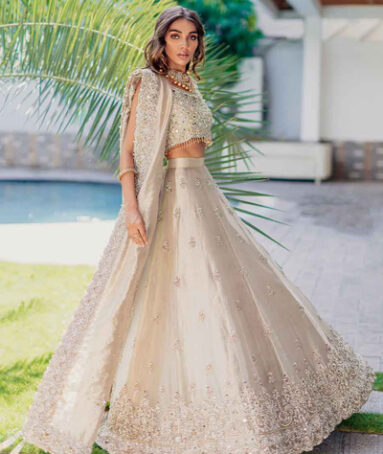 Gold Lehnga Choli With A Mirror